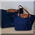 H09. Longchamp valise and handbag. 